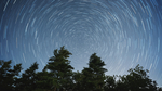 Long exposure of movement of stars, caused by Earth’s rotation