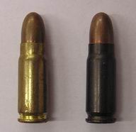 7.62mm Tokarev rounds. Left: Brass case FMJ. Right: lacquered steel case.