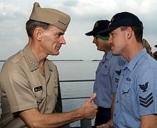 Jay L. Johnson and crewmember aboard USS Harry W. Hill on 24 December 1997