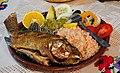 Mojarra frita (fried) served with various garnishes, including nopales, at Isla de Janitzio, Michoacán