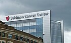 University Hospitals Seidman Cancer Center behind a mixed-use apartment building