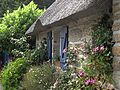 Image 51Roses, clematis, a thatched roof: a cottage garden in Brittany (from Garden design)