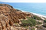 位於加利福尼亞州托利松州立自然保護區（英语：Torrey Pines State Reserve）的大規模海岸侵蝕。