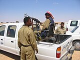 Iranian National Guard with a PK machine gun mounted on a Ford Courier