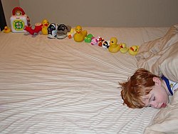 Autistic-sweetiepie-boy-with-ducksinarow.jpg