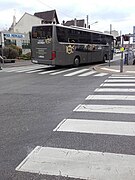 Le S 415 GT-HD no 875 en livrée 10 ans groupe Lacroix, près de la gare de Cormeilles-en-Parisis.