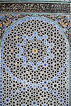 Geometric patterns in zellij tilework at the Al-Attarine Madrasa in Fes (14th century)