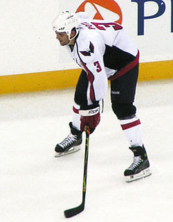 Tom Poti v dresu Washington Capitals