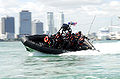 A boatcrew from Coast Guard Maritime Safety and Security Team 91114 conducts high-speed maneuvers during a security patrol south of the Port of Miami