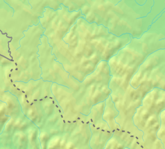 Mapa konturowa Bieszczadów Wschodnich, po lewej nieco na dole znajduje się czarny trójkącik z opisem „Pikuj”