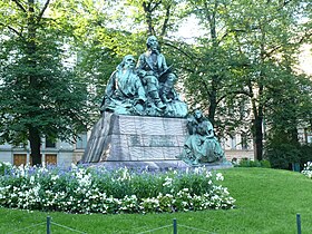 The complete Elias Lönnrot monument, 1902 (with Väinämöinen to his right and Impi to his left[8]) (fi)