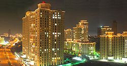 Hiranandani Estate located in Patlipada at night