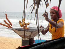 Tradición gastronómica marinera en una playa de Liberia.