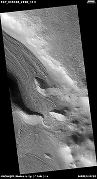 Valley showing Lineated valley fill, as seen by HiRISE under HiWish program Linear valley flow is caused by ice movements. Location is Casius quadrangle.