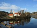 Froland Church located along the river Nidelva