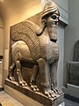 Lamassu, initially depicted as a goddess in Sumerian times, when it was called Lamma, it was later depicted from Assyrian times as a hybrid of a human, bird, and either a bull or lion—specifically having a human head, the body of a bull or a lion, and bird wings, under the name Lamassu.[93][94]