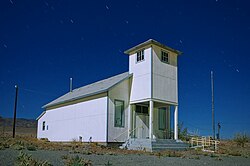 Full moon night at a school house in Luning