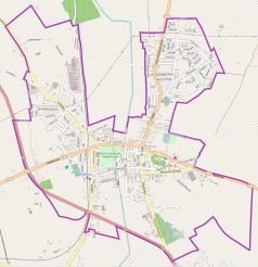 Mapa konturowa Nidzicy, blisko centrum po prawej na dole znajduje się punkt z opisem „Parafia Ewangelicko-Augsburskaw Nidzicy”