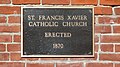 Dedication plaque of St. Francis Xavier Church.