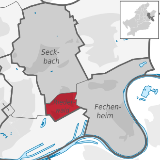 Carte situant le quartier (en rouge) au sein l'arrondissement (en gris foncé) et du reste de la ville (en gris clair)