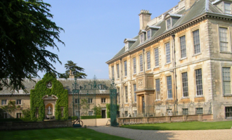 West facade (at right) and the stables (left), separated by a courtyard.