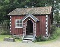 Cappelen-stugu fra Akkerhaugen i Sauherad, Telemark, ca. 1800. Malt som et teglhus med hjørner av huggen stein. Foto:Roede.