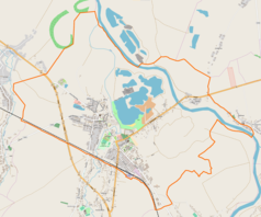 Mapa konturowa Radymna, blisko centrum na dole znajduje się punkt z opisem „ParafiaNajświętszego Serca Pana Jezusaw Radymnie”