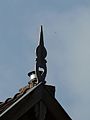 In Nederlands Zuid-Limburg op een rijksmonumentale vakwerkboerderij, Epen (met erachter een moderne schoorsteen)