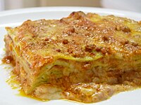 Green lasagna (made with spinach in the dough), with ragù, Parmesan and béchamel sauce, typical of Bolognese cuisine