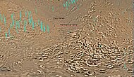 Map of the eastern part of Hellas Planitia (a vast impact crater), showing two large river valleys that slope left, toward the floor of the crater.