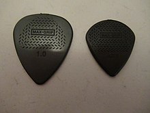 Dunlop "Max-Grip" carbon fiber guitar picks. Sizes 1mm and Jazz III.