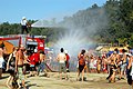 Firefighters cooling dancers off