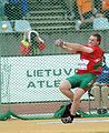 Image 20Yury Shayunou spinning with the hammer within the circle in hammer throw (from Track and field)