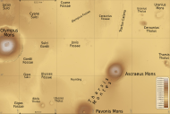 Map of Tharsis quadrangle with major features indicated. Tharsis contains many volcanoes, including Olympus Mons, the tallest known volcano in the Solar System. Notice Ceraunius Tholus, although it looks small, it is about as high as Earth's Mount Everest.