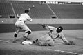 Image 23 Ty Cobb Photo: National Photo Company; restoration: Lise Broer; crop: jjron Ty Cobb (1886–1961), shown here sliding into third base on August 16, 1924, was an American Major League Baseball (MLB) outfielder. He spent twenty-two seasons with the Detroit Tigers, including six as the team's player-manager, and finished his career with the Philadelphia Athletics. During this time Cobb set ninety MLB records, though his abilities were sometimes overshadowed by his surly temperament and aggressive playing style. In 1936 Cobb was made an inaugural member of the Baseball Hall of Fame, and in 1999 editors at the Sporting News ranked him third on their list of "Baseball's 100 Greatest Players". More selected pictures