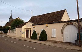 The town hall and church in Jouy