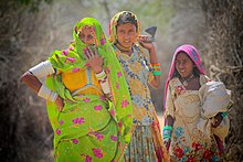 Women set out to collect fuel wood