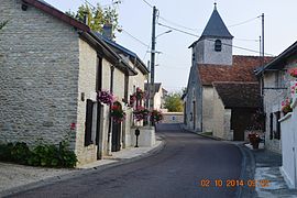 The church and surroundings in Ailleville