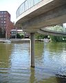 A pillar supporting the circular pedestrian bridge.