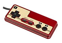 Nintendo Famicom controller, with D-pad having a cross shape