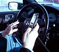 Image 18A New York City driver holding two phones (from Smartphone)