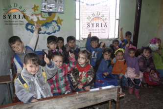 Syrian children attend a NuDay-operated school.