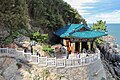 Hongryeonam poised over the sea above the cave