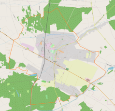 Mapa konturowa Kłobucka, w centrum znajduje się punkt z opisem „Parafia Świętego Marcina”