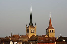 The towers of the Abbey and the Reformed church above Payerne