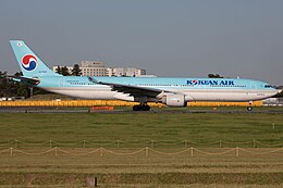 A large white twin-engine passenger jet