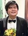 De blinde, Japans klassiek pianist en componist Nobuyuki Tsujii met tweezijdige microftalmie