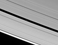 Cassini image showing Pan orbiting in the Encke Gap.