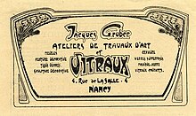 Il s'agit d'un encart promotionnel pour l'atelier de l'artiste Jacques Gruber, comportant son nom, son adresse et ses domaines d'expertise en typographie Art Nouveau.