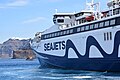 Super Runner Jet, docked at Nea Kameni port in Santorini.